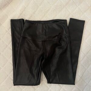 Black Leather Tights (stretchy)
Never worn 
Size M